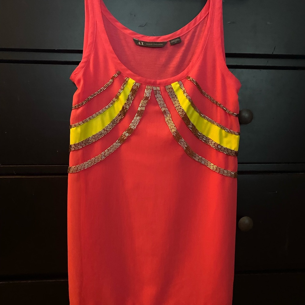 An Armani Exchange size small tank/blouse. Pink with yellow and beading.